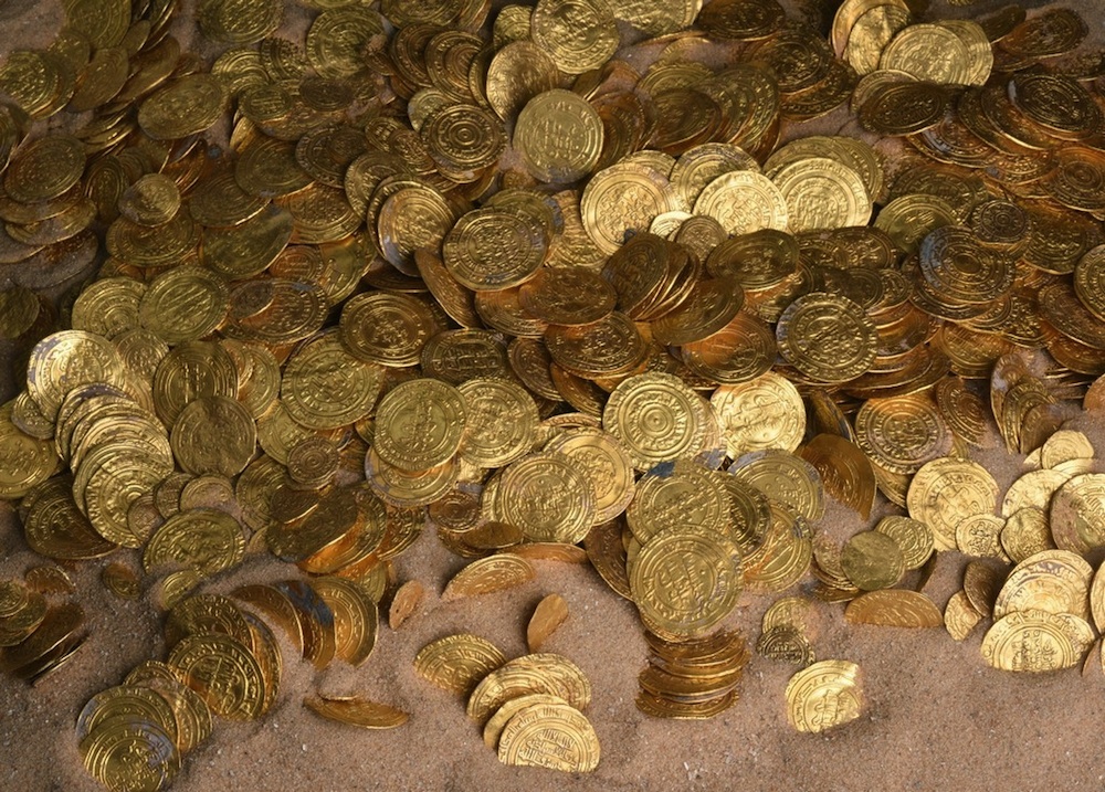 Nearly 2,000 gold coins were discovered off the coast of the ancient city of Caesarea, Israel. The gold coins are about 1,000 years old, and were minted by the Fatimid Caliphate, which ruled much of North Africa at the time. Credit: Israel Antiquities Authority